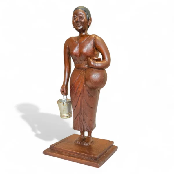 Vintage wooden village woman figurine hand-carved from solid wood holding a bucket – Crafts Asia
